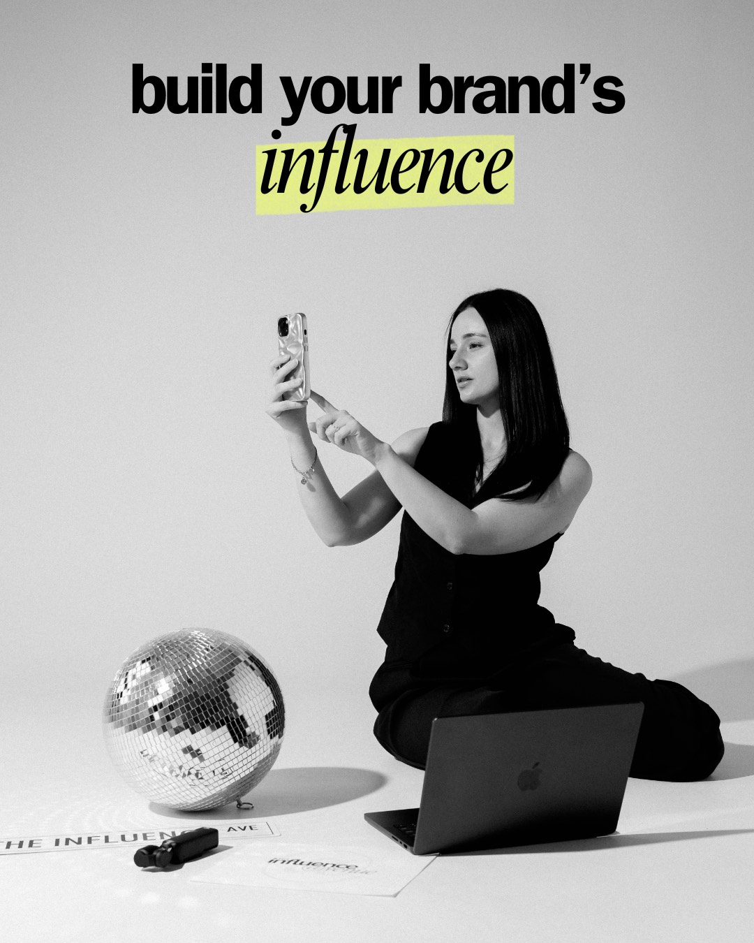 Dani filming on her phone beside a disco ball and laptop, beneath the words: build your brand’s influence